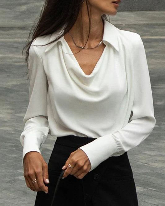 Elegante blusa de manga larga con solapas